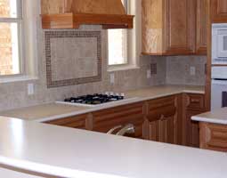 kitchen granite countertops with tiled backsplash